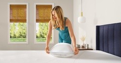 Woman Holding Cloud Hybrid Pillow