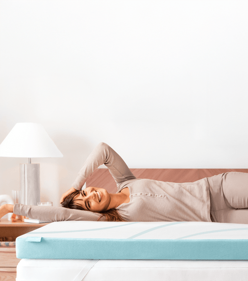 woman laying on tempur adapt plus cooling topper